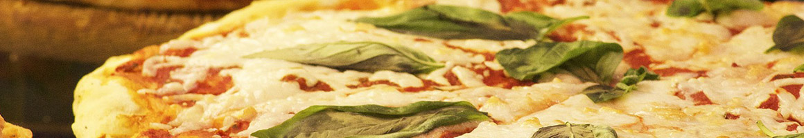 Eating Italian Pizza at Olympia Pizza & Pasta Italian restaurant in Arlington, WA.